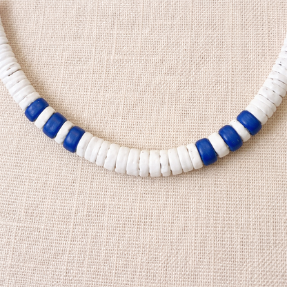Native Treasure 5mm White Clam Heishi Puka Necklace with Dark Blue Coconut Bead Accents – Handmade Island Jewelry